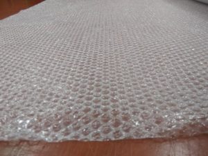 分譲看板を巻くエアークッション